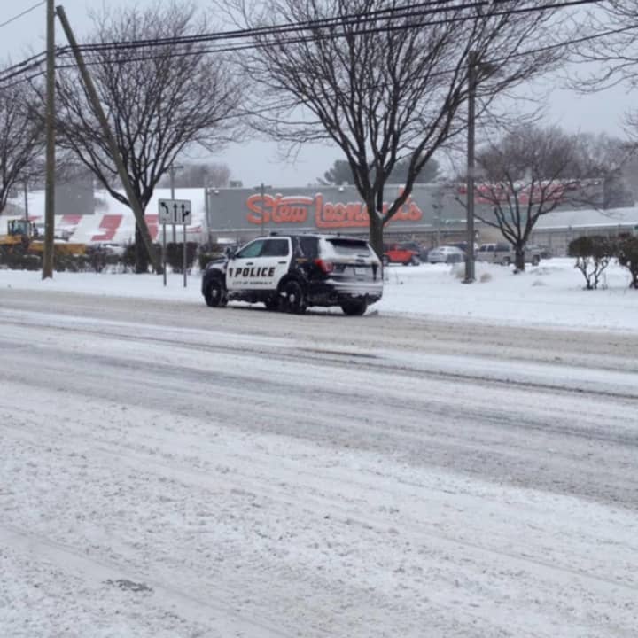 The Norwalk police department posted photos of snow-covered roads on its social media accounts Saturday.
