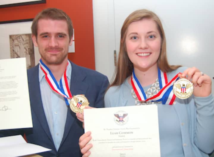 Cameron Driscoll and Leah Common receive Gold President’s Volunteer Service Awards for their work with the Seaside Center in Greenwich Point Park summer programs.