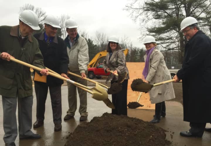 Officials hold the ceremonial groundbreaking of the new seniors housing, Wilton Commons Congregate housing in Wilton on Wednesday.