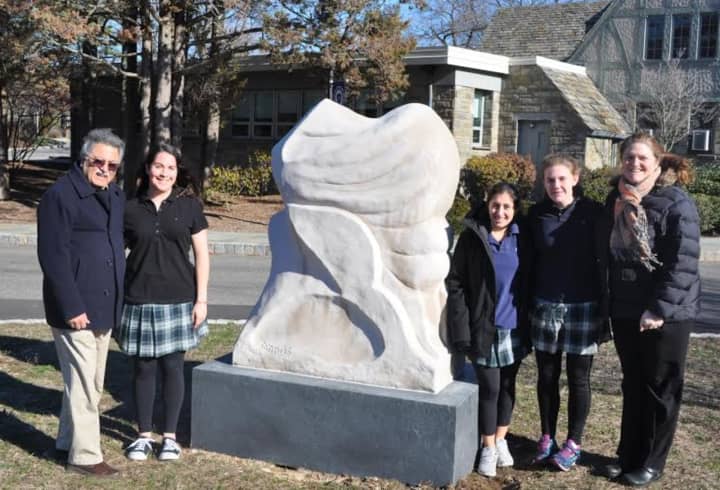 Artist in Residence Satish Joshi and Director of Arts Kimberly Calhoun, at right, with seniors Margaret Brady and Francesca Cristiano and sophomore Tessa Quivelli.