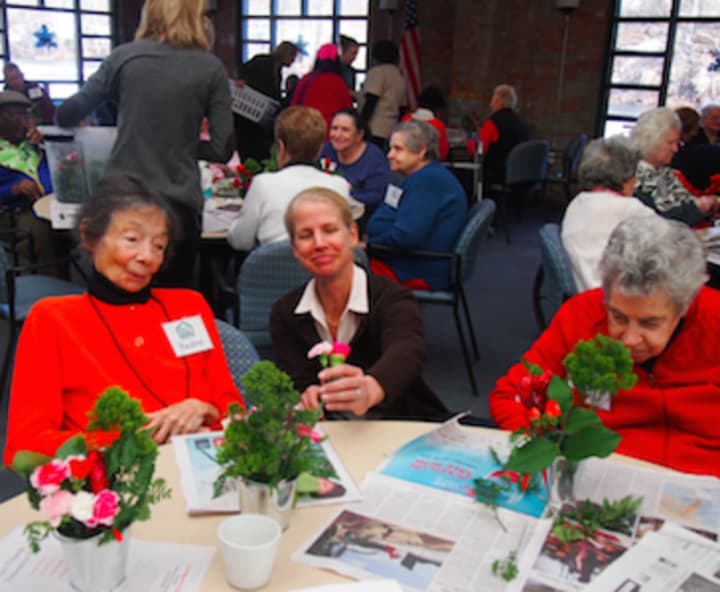 Greenwich Garden Club member Urling Searle assisting at the Greenwich Adult Daycare Center.