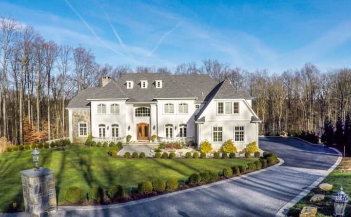 A four-bedroom Mediterranean Colonial in Katonah is listed for $2.5 million by Houlihan Lawrence agent Alicia Albano.