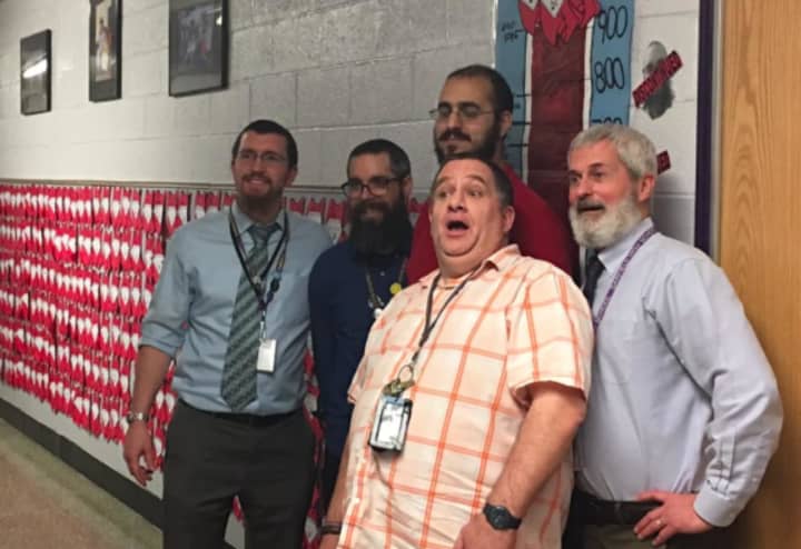 Garfield High School staff prepare for a shave as part of a fundraiser.