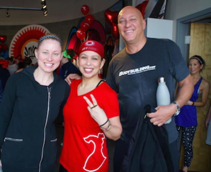 Selina Santos, center, co-executive producer of the Steve Wilkos Show, which films at NBCUniversal’s studios in Stamford, pictured with Wilkos and his wife, Rachelle.