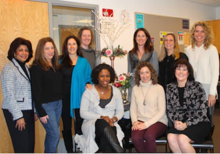 Wilton Library’s gala committee (standing from left) Elaine Tai-Lauria, Kathryn Buis, Tamara Kalin, Betsy Hoffmann, Kathryn Groves, Teresa Waldron and Michele Ferguson Nichols and (seated from left) Priscilla Thors, Michele Klink and Janel Cassara.