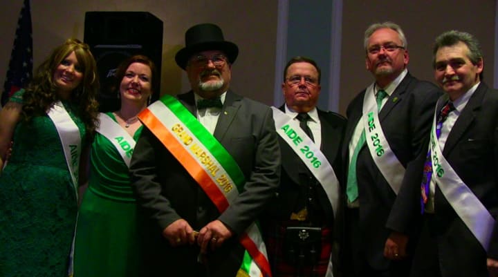 From left, Aides Lauren Brady and Michelle Carter Verna, Grand Marshal Chef Stanley Rupinski, Aides Don “Spanky” MacLennan, Frank McCann and Dartrey “Dart” Thomas