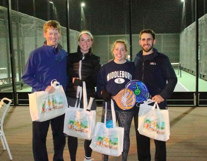 Tournament flight winners Will Oberrender and Brittney Faber with runners up Patrick O&#x27;Callaghan and Margaret Souther.