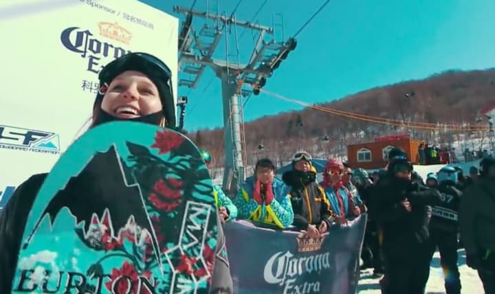 Westport&#x27;s Julia Marino shows a wide smile after becoming the first woman to land two double flips in the World Snowboard Championships last week in China.