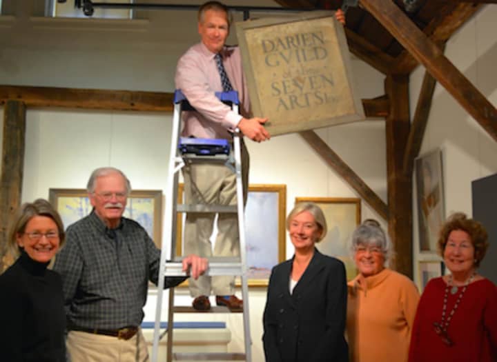Committee members prepare for the Darien Historical Society’s upcoming exhibit, &quot;Darien 1925-1950 ~ Golden Age of Art and Design.&quot;