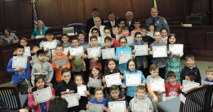 Hasbrouck Heights kids were honored for collecting a complete set of police trading cards.