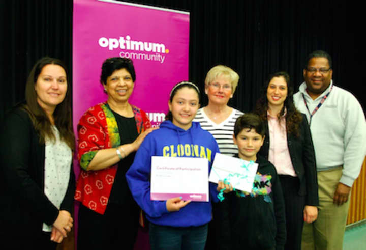 Aline Correa, third from left, a sixth-grade student at Cloonan Middle School, is a finalist in Optimum Community’s inaugural “Black History Month” essay contest.