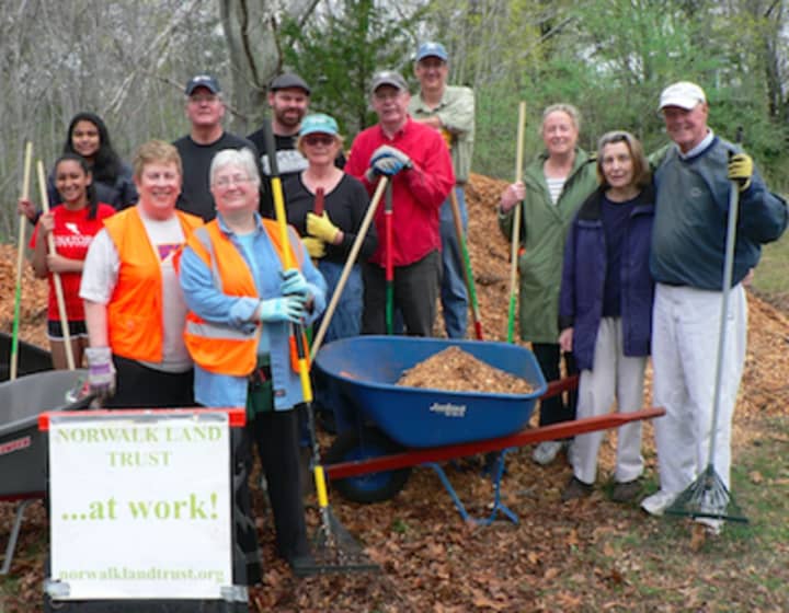 Volunteers gathered by the Norwalk Land Trust at the Farm Creek Preserve in Rowayton to clean up debris and put down mulch.
