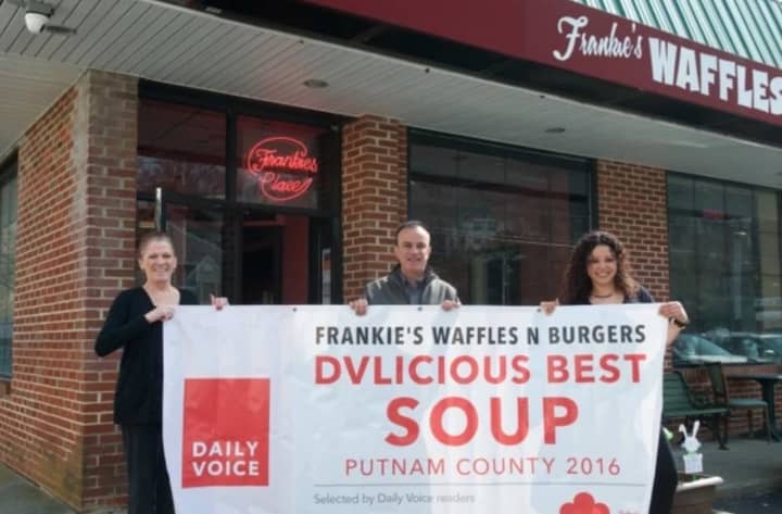 This is the banner that was stolen from Frankie&#x27;s Waffles &amp; Burgers in Mahopac. Above, Carina Evangelista, far right, and Marian Feliciotto of Frankie&#x27;s with Daily Voice Director of Media Initiatives/Managing Editor Joe Lombardi in March.