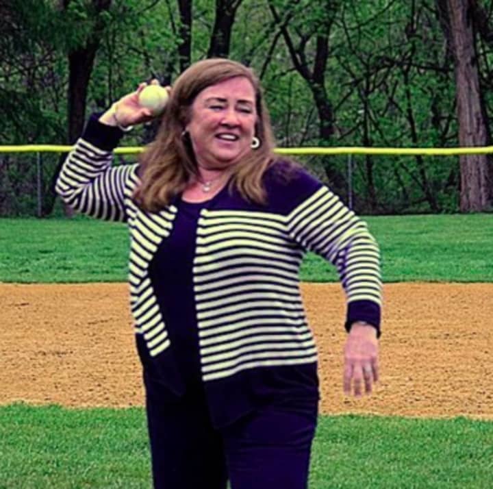 Mayor Diane Didio throws out the first pitch at Little League opening day in Oradell.