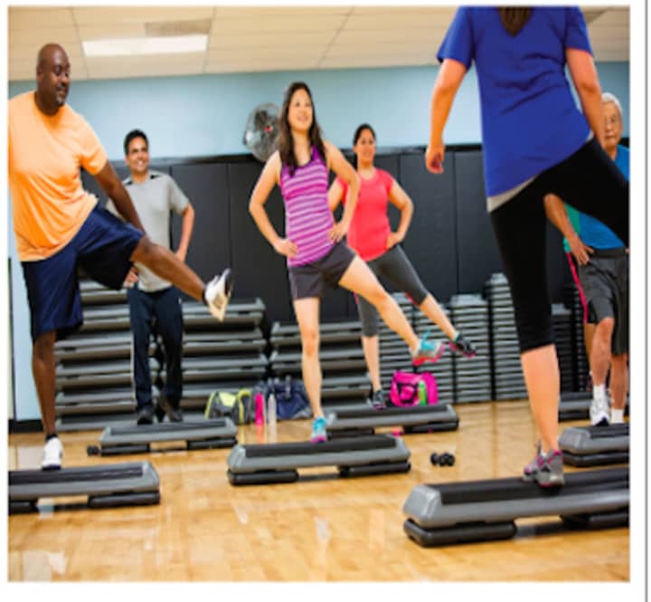 Adults taking a step class at the Brookfield YMCA. The Regional YMCA of Western Connecticut in Brookfield and a Greater Danbury Coalition called “Getting There” have convened to raise interest on the importance of physical activity.