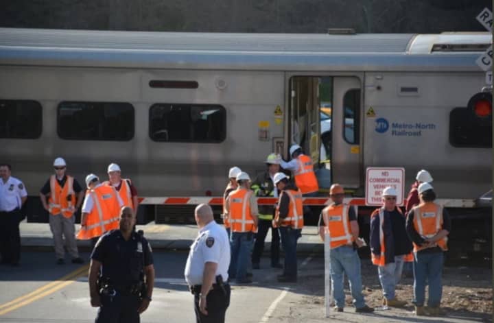 Investigators at the scene at the train crossing where the collision occurred Wednesday afternoon in Bedford Hills.
