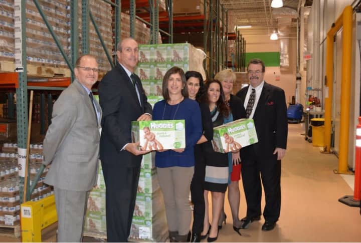 The Junior League of Westchester supports the diaper bank among projects. Shown here is the Westchester Diaper Bank receiving a Huggies donation of 90K diapers, warehoused by the Food Bank for Westchester.