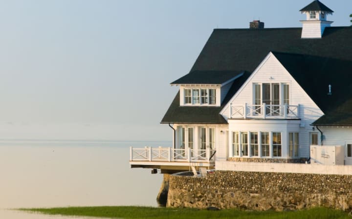 A Bell Island home in Rowayton is one of the pictures used in a new digital guide created by Houlihan Lawrence that touts living in Fairfield County.