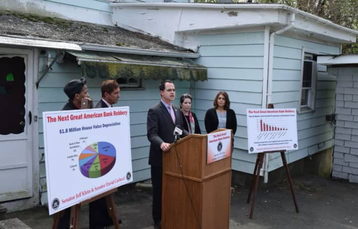 Sen. David Carlucci explains how zombie properties have cost Rockland homeowners about $11.6 million in property value depreciation.