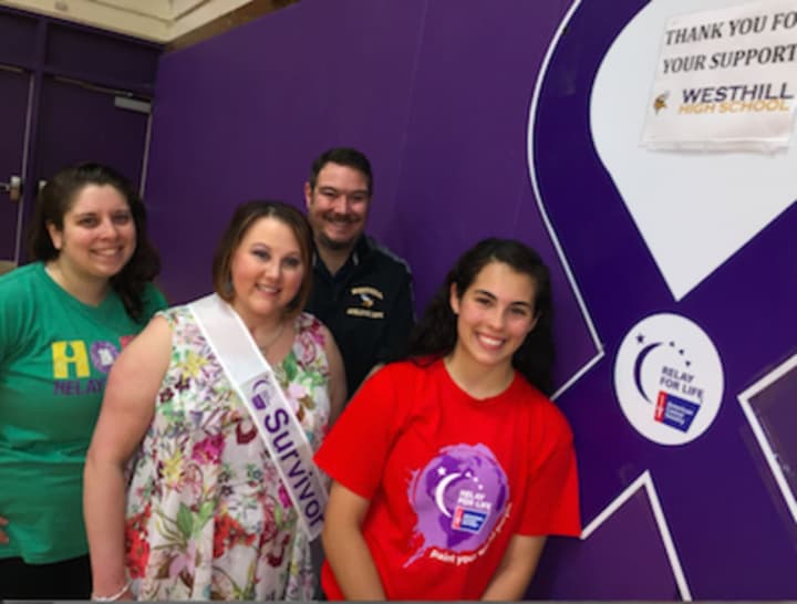 Westhill High School senior Silvana Cordona, right, joined from left: Grace Sinto, American Cancer Society, teacher and cancer survivor Danielle Waring and assistant principal PJ Wax. The Stamford school had its first Relay for Life event Friday.