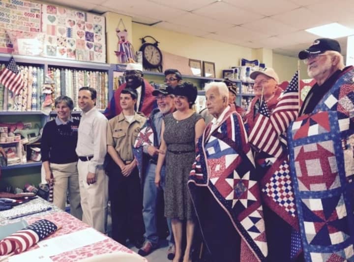 U.S. military veterans received quilts last year at Christie&#x27;s Quilting Boutique in Norwalk as part of the Quilts of Valor program.