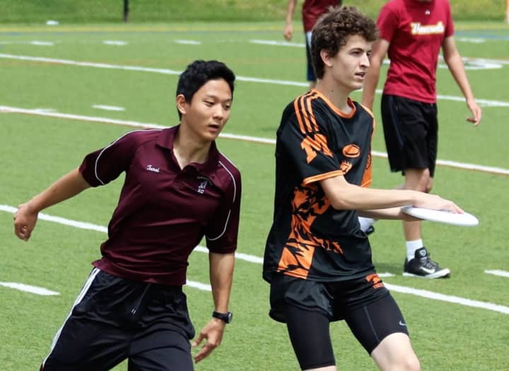 Competition in the New York State Ultimate Frisbee Sectional tournament at Mamaroneck High School on Saturday, May 14.