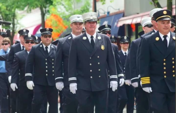 Members of the Hastings-on-Hudson Fire Department marching in the town&#x27;s 2015 Memorial Day Parade.
