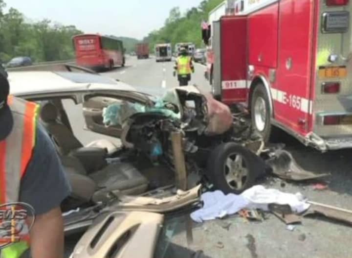 A car collided with with a firetruck on I-87 in Ardsley on Friday.