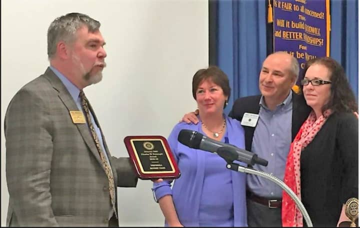 The Trumbull Rotary Club was honored with the Charles W. Pettingill Award. Accepting this award from District Governor Elect Paul Mangels are the club&#x27;s three immediate past presidents: Holly Sutton-Darr, Jim Malski and Karen DelVecchio.