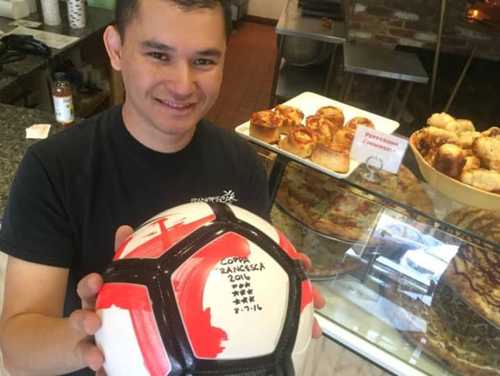 Sal Reina holds the 2016 Coppa Francesca ball in his Glen Rock shop.
