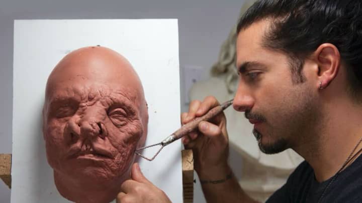 Mike Marino working on a mask.