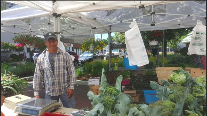 Jose Lopes, who works at Smith&#x27;s Acres LLC in Niantic, was one of the vendors at the Danbury Farmers&#x27; Market&#x27;s opening day on Saturday.