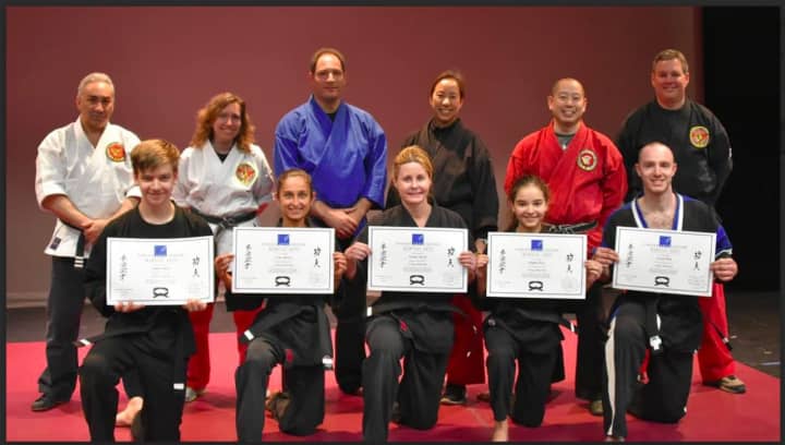 Darien Arts Center awards nine black belts. See story for IDs.