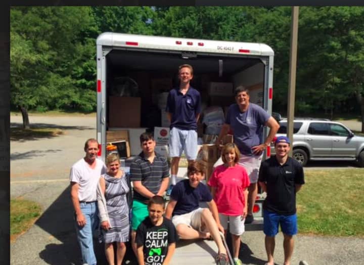 Volunteers dropping off goods and picking up crafts in Gassaway, West Virginia (not far from the recent flooding.)