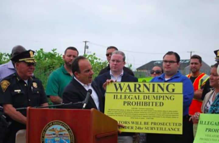 Mayor Joe Ganim announces a new $200 reward for tips that lead to an arrest on blight and illegal dumping charges in Bridgeport.