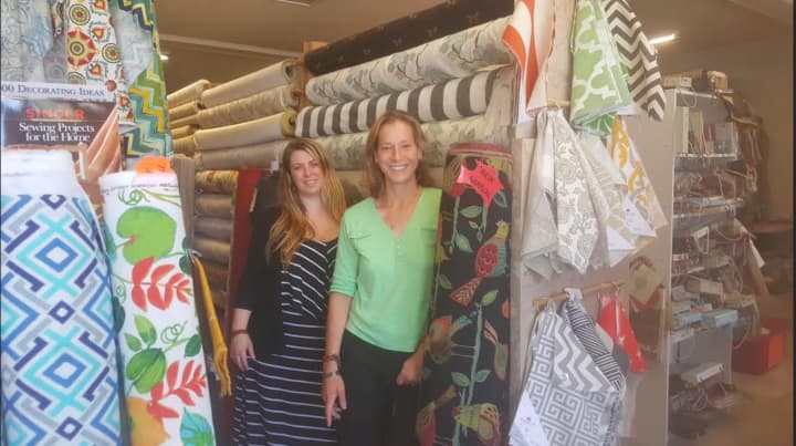 Owner Laura Gardner and manager Ivy Chirco at Chintz-N-Prints in Newtown. The store will be celebrating 60 years in business.