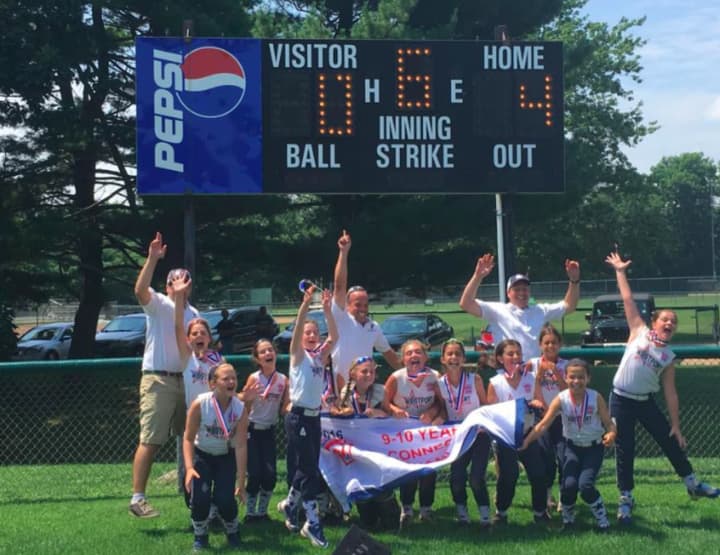 The Westport 10-and-under softball all-stars celebrate their state championship.