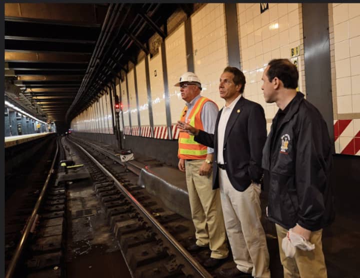 Gov. Andrew Cuomo and state officials survey standing water in the subway stations that will be treated with larvicide tablets to reduce the breeding of Zika carrying mosquitoes.