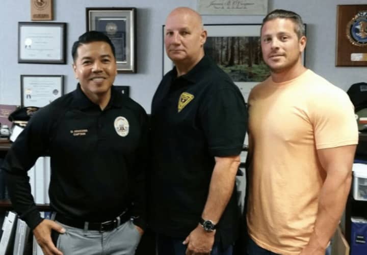 South Gate California Police Captain Darren Arakawa (left) met with Chief James B. O&#x27;Connor and Sgt. Richard Pizzuti (right) to discuss the Pink Patch Project