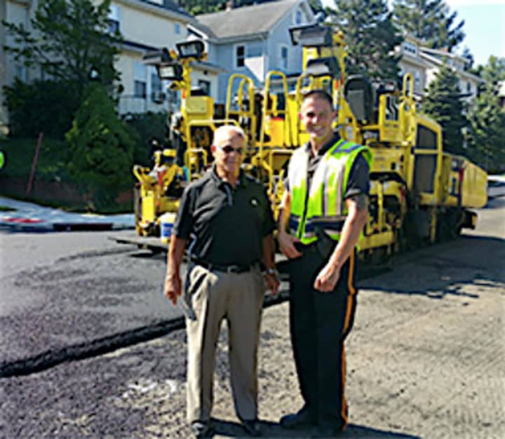 Department of Public Works Commissioner Matthew T. Ruzzo and Officer James Goral on the 500 block of Chase Avenue.