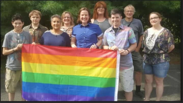 Members of the LGBTQ community at an outdoor potluck event held at the Unitarian Universalist Congregation of Danbury.