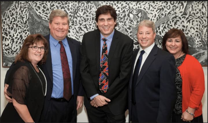 Save the date for the Eighth Annual HCC Alumni Hall Of Fame Gala set for Nov. 19. Pictured here from the 2015 gala (left to right): Donna and Scott Crane of Reynolds &amp; Rowella, LLP; comedian Wayne Cotter; and Ben and Anne Marie Maini.