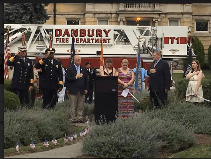 Danbury Mayor Mark Boughton with Vycki Higley Pratt and Amanda Higley at the Sept. 11 Memorial Remembrance Gathering on Friday evening at Elmwood Park. Danbury resident Rob Higley perished in the 9/11 attacks.