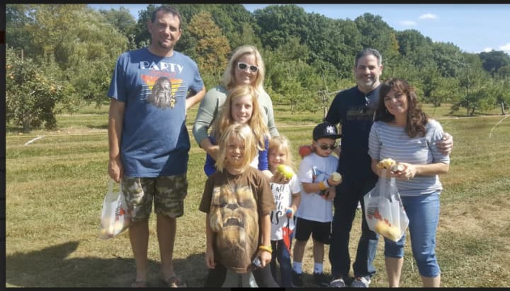 The Mietz family with friends at Blue Jay Orchards in Bethel