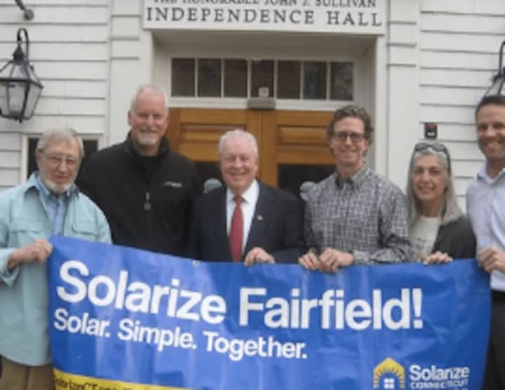 From left to right: Clean Energy Task Force Members Larry Kaley and Bob Wall, First Selectman Mike Tetreau, Clean Energy Task Force Chair Scott Thompson, and Clean Energy Task Force Members Mary Hogue and Bill Leavy.