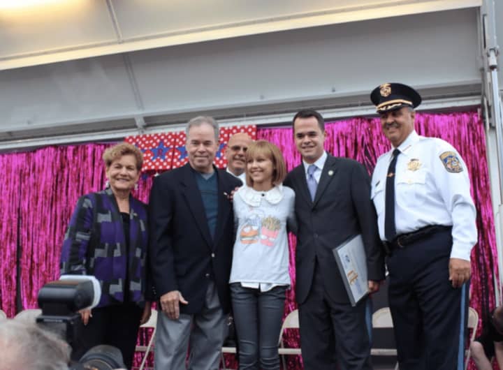 Grace VanderWaal, center, poses with Assemblywoman Ellen Jaffee, County Executive Ed Day, Suffern Mayor Ed Markunas, State Sen. David Carlucci, and County Sheriff Louis Falco.
