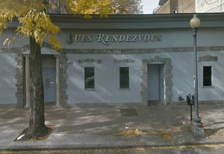 A Fishkill resident has been arrested after a woman was shot outside Sues Rendezvous in Mount Vernon.