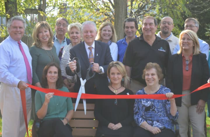 Realtors, town officials and friends opened the new pocket park at the corner of Oldfield and Reef roads Monday.