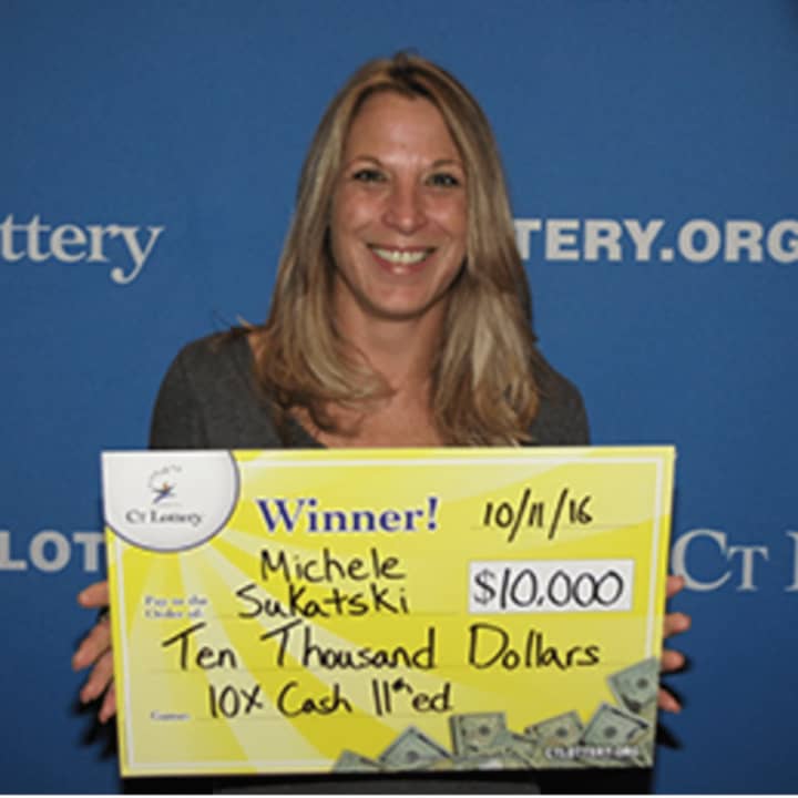 Michele Sukatski of Stamford wins in the “10X The Cash&quot; lottery game last month.