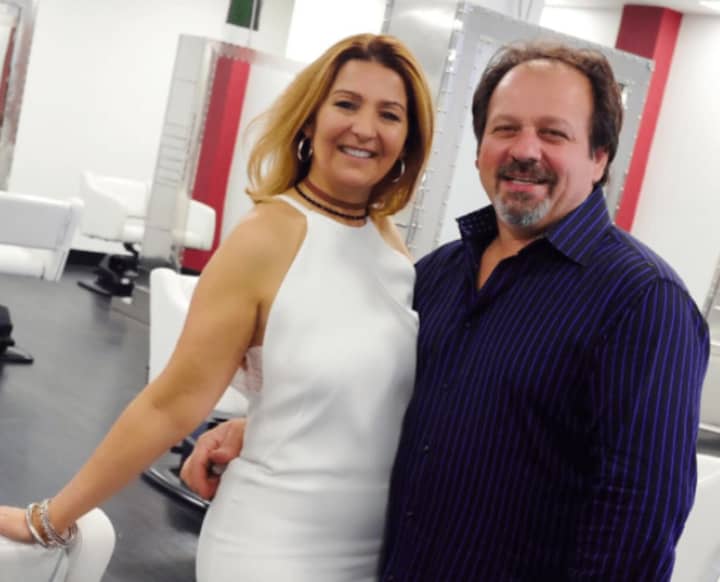 Basil and Maria Kons of Piermont, N.Y. celebrate the grand opening of their Paramus salon.